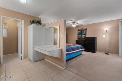 Beautifully situated on the 13th green of the scenic Ahwatukee on Ahwatukee Country Club in Arizona - for sale on GolfHomes.com, golf home, golf lot