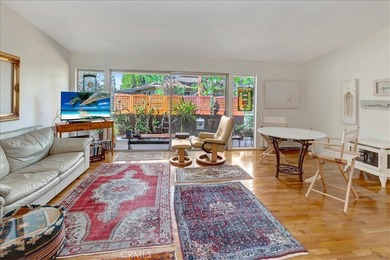 Beautifully located second-floor residence overlooking a on Leisure Village Par 3 Golf Course in California - for sale on GolfHomes.com, golf home, golf lot