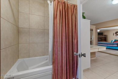 Beautifully situated on the 13th green of the scenic Ahwatukee on Ahwatukee Country Club in Arizona - for sale on GolfHomes.com, golf home, golf lot