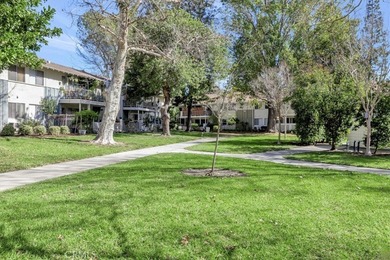 Beautifully located second-floor residence overlooking a on Leisure Village Par 3 Golf Course in California - for sale on GolfHomes.com, golf home, golf lot