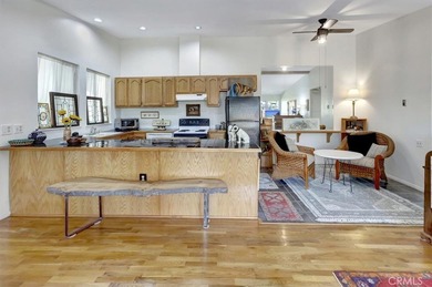 Beautifully located second-floor residence overlooking a on Leisure Village Par 3 Golf Course in California - for sale on GolfHomes.com, golf home, golf lot