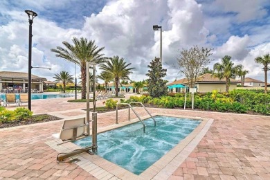 Welcome to your dream vacation home and income-producing on The Oasis Club at Champions Gate in Florida - for sale on GolfHomes.com, golf home, golf lot