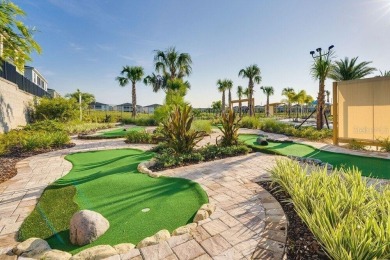 Welcome to your dream vacation home and income-producing on The Oasis Club at Champions Gate in Florida - for sale on GolfHomes.com, golf home, golf lot
