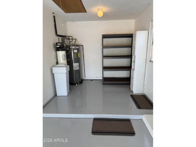 Beautifully situated on the 13th green of the scenic Ahwatukee on Ahwatukee Country Club in Arizona - for sale on GolfHomes.com, golf home, golf lot