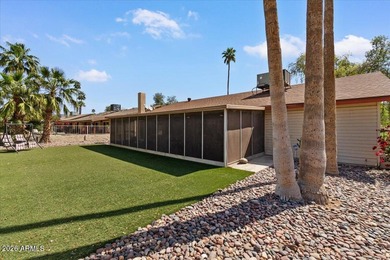 Beautifully situated on the 13th green of the scenic Ahwatukee on Ahwatukee Country Club in Arizona - for sale on GolfHomes.com, golf home, golf lot