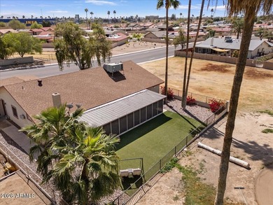 Beautifully situated on the 13th green of the scenic Ahwatukee on Ahwatukee Country Club in Arizona - for sale on GolfHomes.com, golf home, golf lot