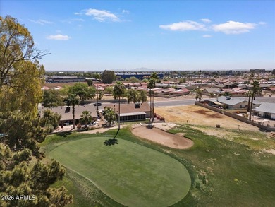 Beautifully situated on the 13th green of the scenic Ahwatukee on Ahwatukee Country Club in Arizona - for sale on GolfHomes.com, golf home, golf lot