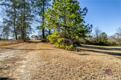 Surveyed at 95.25 acres with almost 836 ft of paved road on Uncle Remus Golf Course in Georgia - for sale on GolfHomes.com, golf home, golf lot