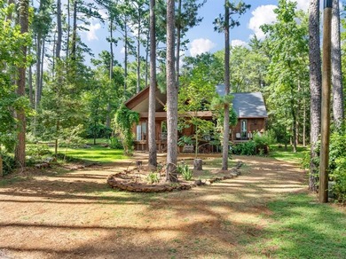Peaceful and stunning lodge-style home in the heart of Holly on Holly Lake Ranch Golf Club in Texas - for sale on GolfHomes.com, golf home, golf lot