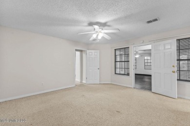 Welcome to this well-maintained 3-bedroom, 2-bath single-family on Diamondhead Country Club in Mississippi - for sale on GolfHomes.com, golf home, golf lot