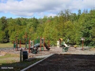 Tanglwood Lakes Community! This wooded lot is perfect for on Paupack Hills Golf and Country Club in Pennsylvania - for sale on GolfHomes.com, golf home, golf lot