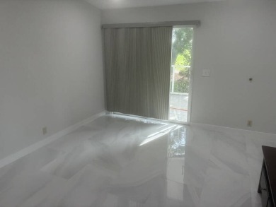 (In a 55 and over community)  Lovely unfurnished 2 bedrooms and on Del Tura Golf and Country Club in Florida - for sale on GolfHomes.com, golf home, golf lot