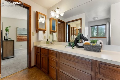 Nestled on a serene cul-de-sac and backing to open space, this on Woodmoor Pines Country Club in Colorado - for sale on GolfHomes.com, golf home, golf lot