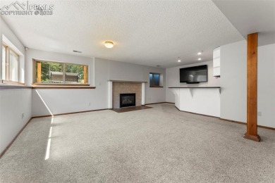 Nestled on a serene cul-de-sac and backing to open space, this on Woodmoor Pines Country Club in Colorado - for sale on GolfHomes.com, golf home, golf lot