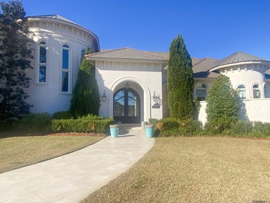 Experience refined living in this exceptional custom home on Pelican Point Golf Club in Louisiana - for sale on GolfHomes.com, golf home, golf lot