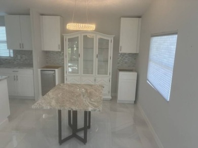 (In a 55 and over community)  Lovely unfurnished 2 bedrooms and on Del Tura Golf and Country Club in Florida - for sale on GolfHomes.com, golf home, golf lot