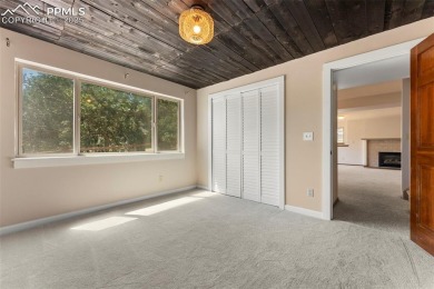 Nestled on a serene cul-de-sac and backing to open space, this on Woodmoor Pines Country Club in Colorado - for sale on GolfHomes.com, golf home, golf lot
