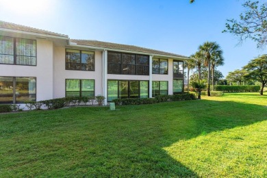 Experience the best of Quail Ridge in this stunning 2nd-floor on Quail Ridge Golf Course and Country Club in Florida - for sale on GolfHomes.com, golf home, golf lot