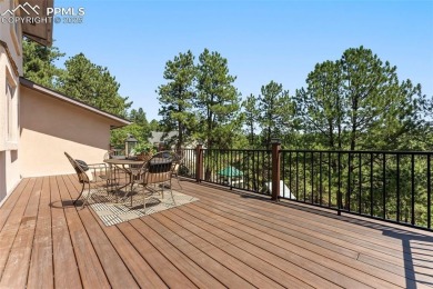 Nestled on a serene cul-de-sac and backing to open space, this on Woodmoor Pines Country Club in Colorado - for sale on GolfHomes.com, golf home, golf lot