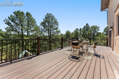 Nestled on a serene cul-de-sac and backing to open space, this on Woodmoor Pines Country Club in Colorado - for sale on GolfHomes.com, golf home, golf lot