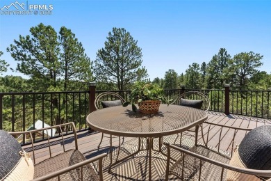Nestled on a serene cul-de-sac and backing to open space, this on Woodmoor Pines Country Club in Colorado - for sale on GolfHomes.com, golf home, golf lot