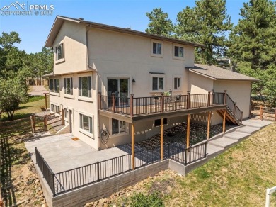 Nestled on a serene cul-de-sac and backing to open space, this on Woodmoor Pines Country Club in Colorado - for sale on GolfHomes.com, golf home, golf lot