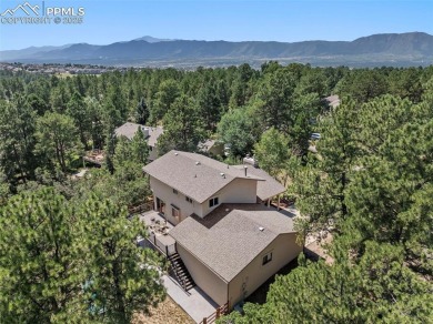 Nestled on a serene cul-de-sac and backing to open space, this on Woodmoor Pines Country Club in Colorado - for sale on GolfHomes.com, golf home, golf lot