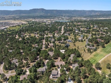 Nestled on a serene cul-de-sac and backing to open space, this on Woodmoor Pines Country Club in Colorado - for sale on GolfHomes.com, golf home, golf lot