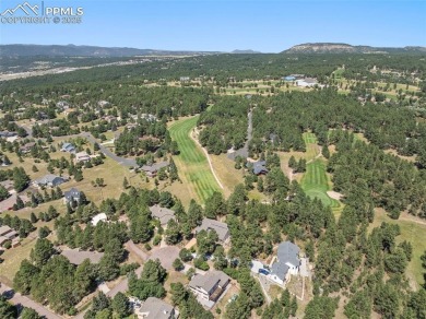 Nestled on a serene cul-de-sac and backing to open space, this on Woodmoor Pines Country Club in Colorado - for sale on GolfHomes.com, golf home, golf lot