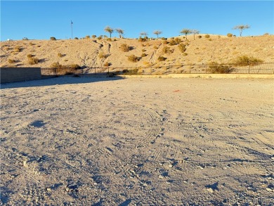 Just under a quarter of an acre of land nestled in a Cul-de-Sac on Laughlin Ranch Golf Club in Arizona - for sale on GolfHomes.com, golf home, golf lot