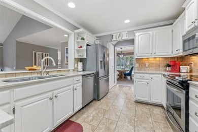 Spacious Golf Course Living with Poolside Charm. Nestled along on Indian Springs Country Club in Oklahoma - for sale on GolfHomes.com, golf home, golf lot