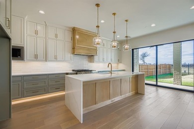 You will love this fabulous design from American Legend Homes on The Tribute At the Colony in Texas - for sale on GolfHomes.com, golf home, golf lot