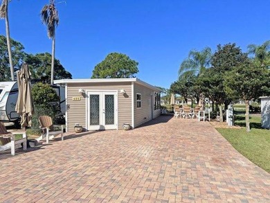 Beautifully landscaped oversized RV lot with 430 sq.ft on The Great Outdoors Golf and Country Club in Florida - for sale on GolfHomes.com, golf home, golf lot