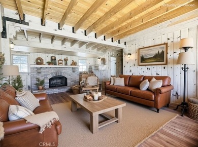 Nestled beneath towering pine trees, this charming 3-bedroom on Lake Arrowhead Country Club in California - for sale on GolfHomes.com, golf home, golf lot