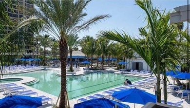 Beautiful corner unit1 bedroom 1 bath, first floor.  concrete on Ocean Village Golf Course in Florida - for sale on GolfHomes.com, golf home, golf lot