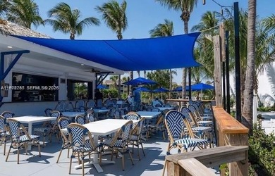 Beautiful corner unit1 bedroom 1 bath, first floor.  concrete on Ocean Village Golf Course in Florida - for sale on GolfHomes.com, golf home, golf lot