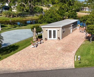 Beautifully landscaped oversized RV lot with 430 sq.ft on The Great Outdoors Golf and Country Club in Florida - for sale on GolfHomes.com, golf home, golf lot