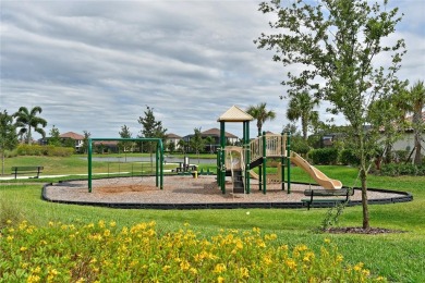 Discover luxury living in the picturesque, gated community of on Esplanade Golf and Country at Lakewood Ranch in Florida - for sale on GolfHomes.com, golf home, golf lot