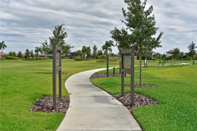 Discover luxury living in the picturesque, gated community of on Esplanade Golf and Country at Lakewood Ranch in Florida - for sale on GolfHomes.com, golf home, golf lot