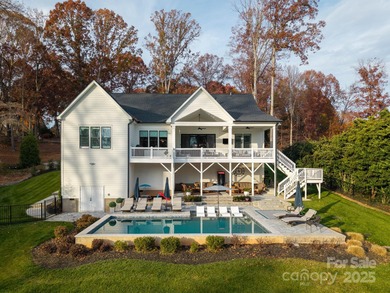 Discover refined lakeside living in this custom home completed on Mallard Head Country Club in North Carolina - for sale on GolfHomes.com, golf home, golf lot