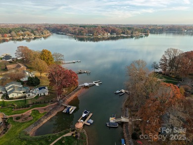 Discover refined lakeside living in this custom home completed on Mallard Head Country Club in North Carolina - for sale on GolfHomes.com, golf home, golf lot
