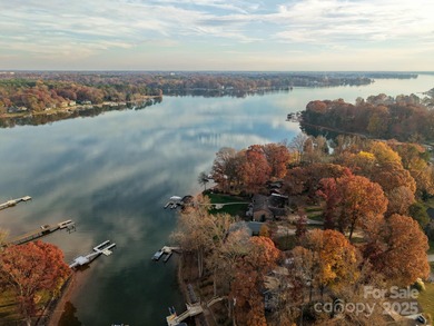 Discover refined lakeside living in this custom home completed on Mallard Head Country Club in North Carolina - for sale on GolfHomes.com, golf home, golf lot