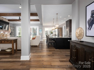 Discover refined lakeside living in this custom home completed on Mallard Head Country Club in North Carolina - for sale on GolfHomes.com, golf home, golf lot