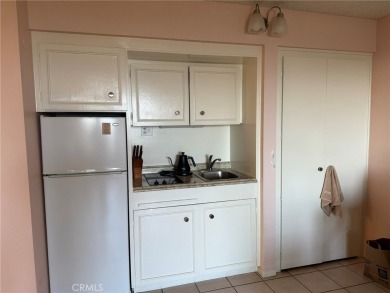 Welcome to this charming 9th-floor 1-bedroom retreat at The on Leisure Village Par 3 Golf Course in California - for sale on GolfHomes.com, golf home, golf lot