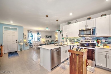 This coastal contemporary home with private preserve view will on Herons Glen Golf and Country Club in Florida - for sale on GolfHomes.com, golf home, golf lot