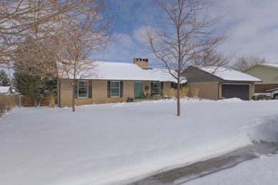 Come fall in love with this 5 bed, 3 bath home with 2 en suites on Olive Glenn Golf and Country Club in Wyoming - for sale on GolfHomes.com, golf home, golf lot