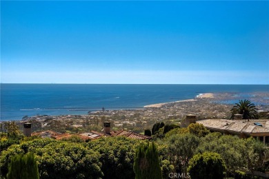 Indulge in elegant coastal living at this opulent ocean-view on Pelican Hill Golf Club in California - for sale on GolfHomes.com, golf home, golf lot