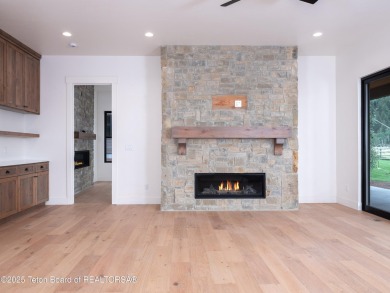 This brand-new custom home in Teton Reserve sits on one of the on Teton Reserve in Idaho - for sale on GolfHomes.com, golf home, golf lot