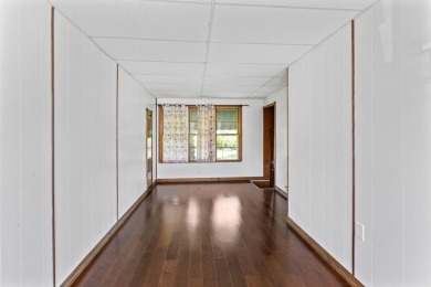 Discover this beautifully updated 1,400 sqft ranch, perfect for on Flushing Valley Golf and Country Club in Michigan - for sale on GolfHomes.com, golf home, golf lot