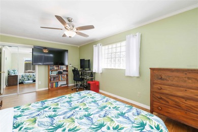 Experience quintessential Florida living in this spacious on Village Green Golf Club of Sarasota in Florida - for sale on GolfHomes.com, golf home, golf lot